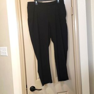 Black trouser pants with tapered legs
